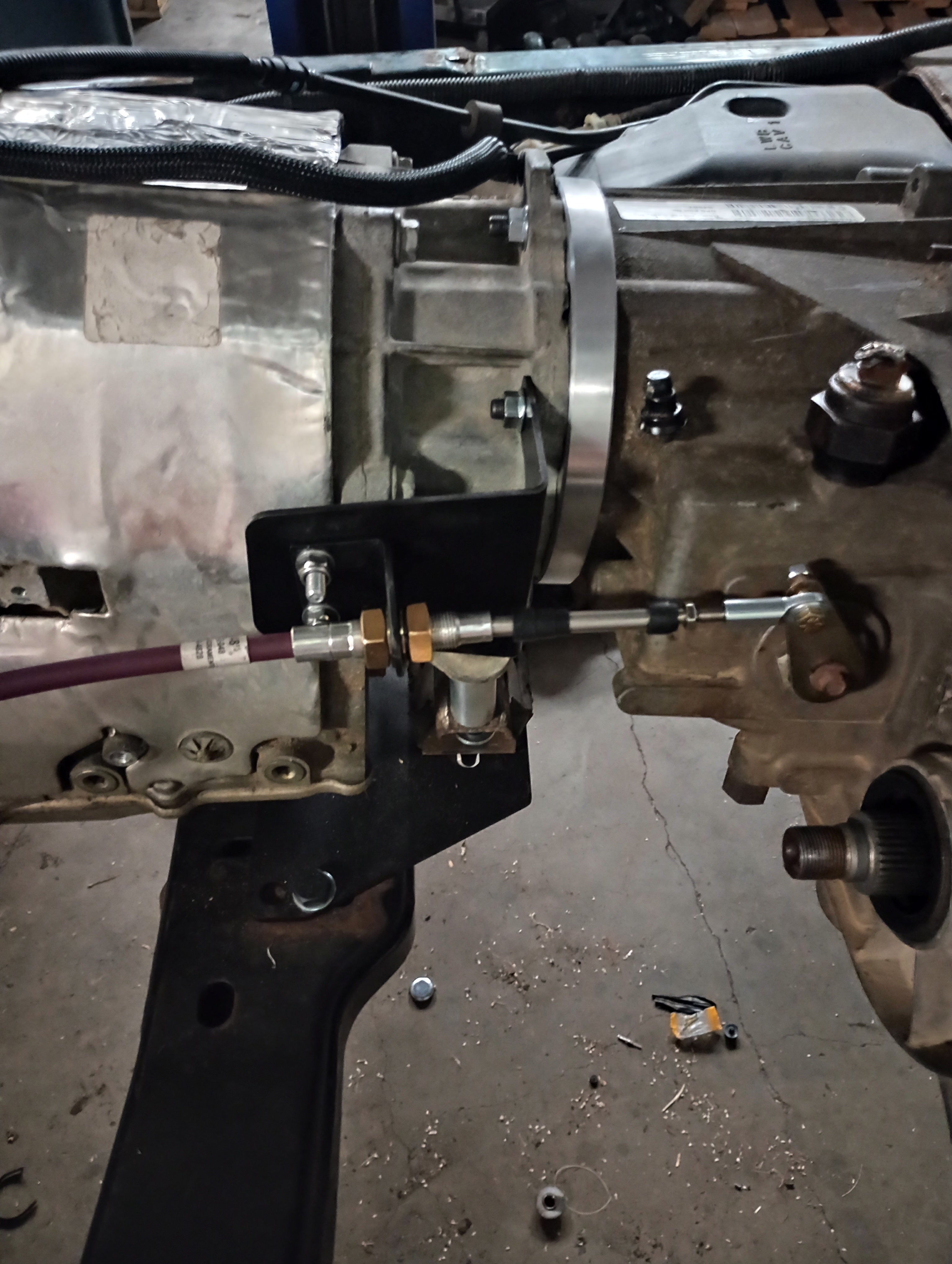 Wicked Wrench Motorsports heavy duty transfer case beef up bracket mounted on a Jeep Wrangler JK chassis side profile view