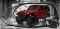 Wicked Wrench Pro-Series Gen V GM LT V8 engine swap integration wiring harness blueprint overlay diagram featuring a red custom Jeep Wrangler JK JKU and a 6.2L engine in a professional performance garage setting.